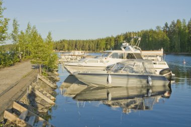 Boats on lake clipart