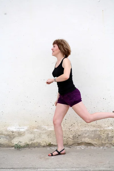 Dziewczynka jogging — Zdjęcie stockowe