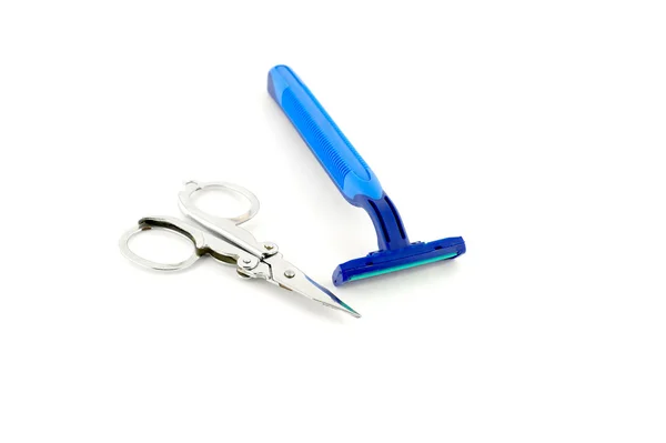 Shaving-set and nail scissors over white — Stock Photo, Image