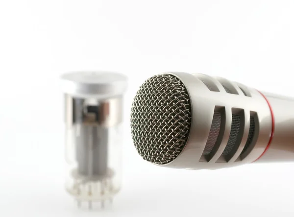Microphone and old glass triode (valve) — Stock Photo, Image