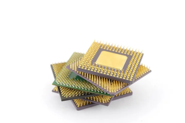 Шесть микропроцессоров поверх белого — стоковое фото