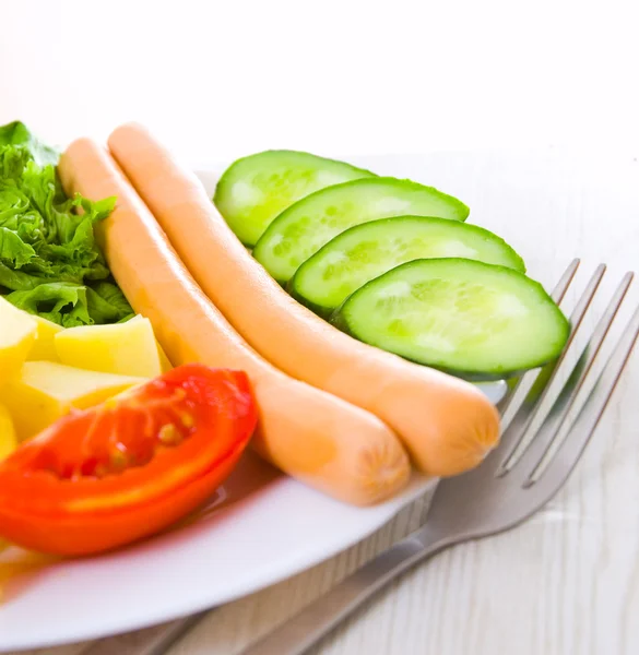 Sausage with vegetables — Stock Photo, Image