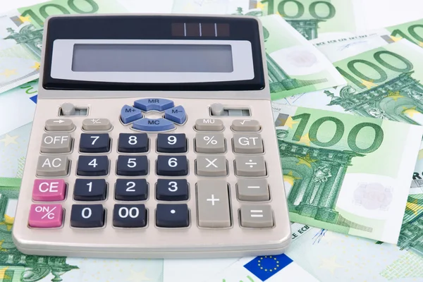 Euros fundo e calculadora — Fotografia de Stock