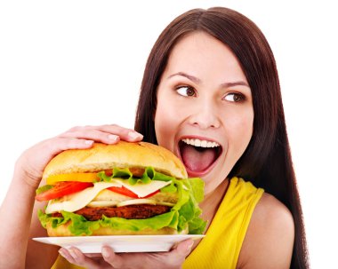 Woman holding hamburger. clipart