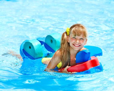 Children in swimming pool. clipart