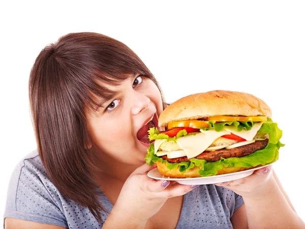 Жінка їдять гамбургер . — стокове фото