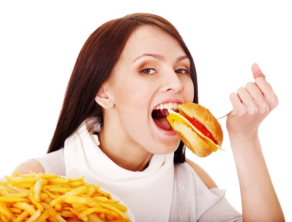 Mujer comiendo comida rápida. — Foto de Stock