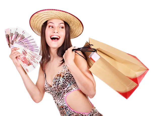 Kobieta z pieniędzy i torba na zakupy. — Zdjęcie stockowe