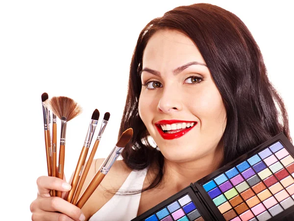 Flicka tillämpa makeup. — Stockfoto