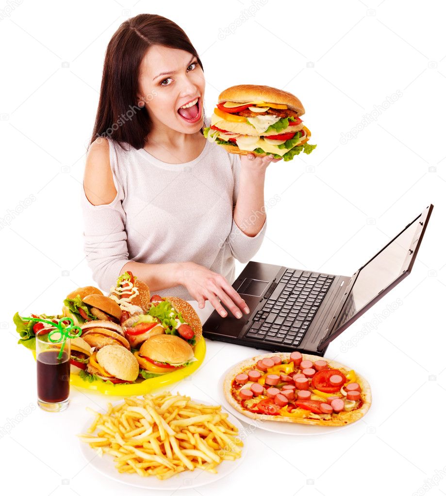 Woman eating junk food.