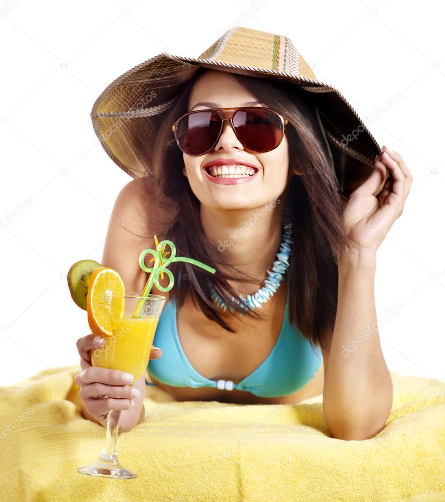 Girl in bikini drink juice through straw.