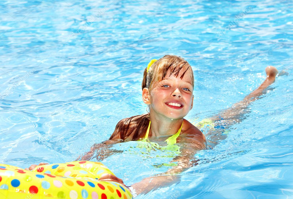 Kid sitting on inflatable ring. Stock Photo by ©poznyakov 11295785