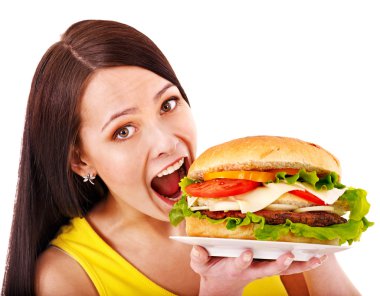 Woman holding hamburger. clipart