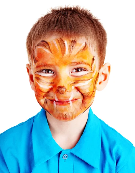 Chłopiec dziecko z malowania twarzy. — Zdjęcie stockowe