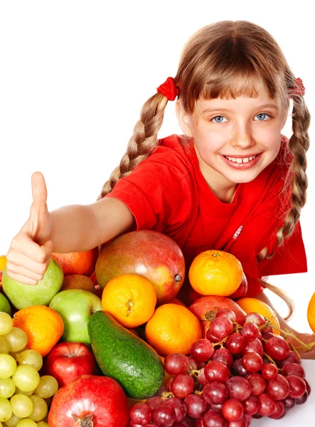 Meisje met groep van fruit. — Stockfoto