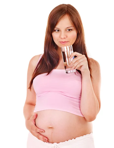 Kobieta w ciąży pić wody. — Zdjęcie stockowe