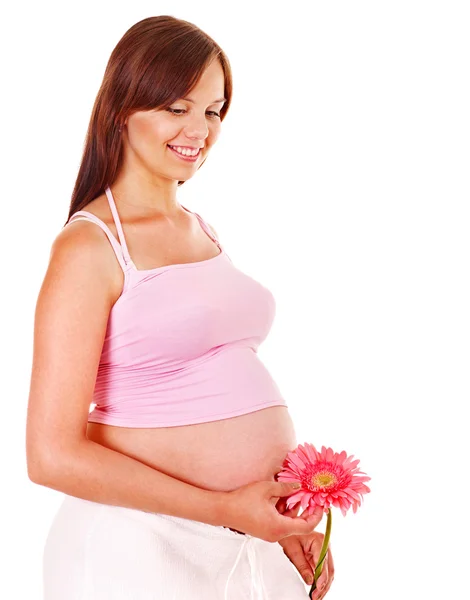 妊娠中の女性の花を持つ. — ストック写真