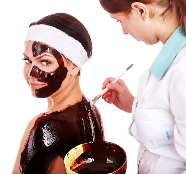 stock image Girl having chocolate body mask.