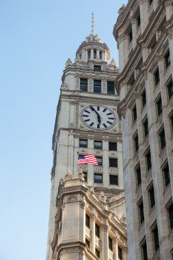 Wrigley building at sunset clipart