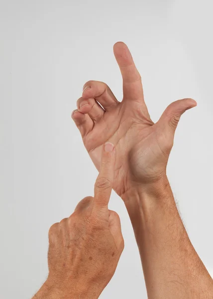 Manlig hand innehav osynliga smartphone — Stockfoto