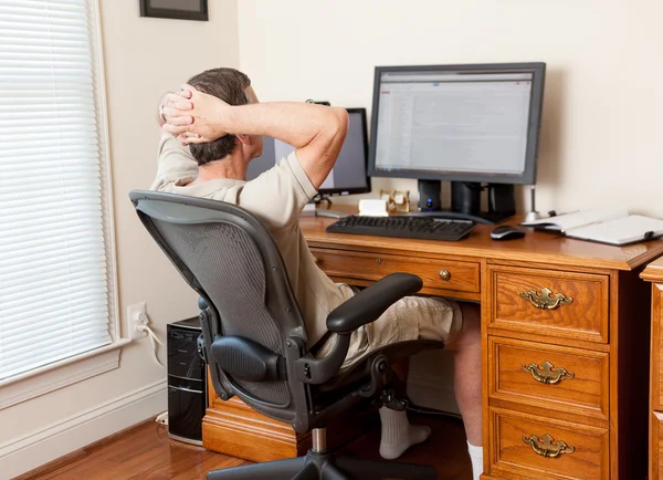 Senior male working in home office — Stock Photo, Image