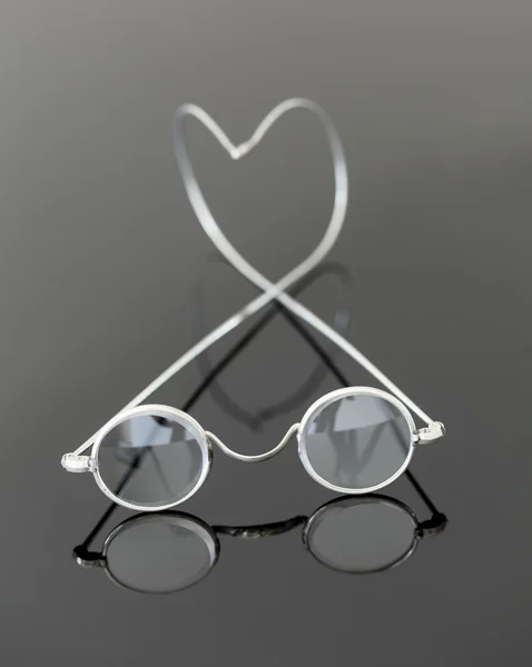 stock image Pair of old magnifying reading glasses