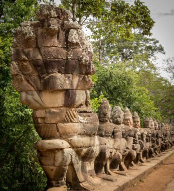 Warriors line entrance to south gate angkor thom clipart