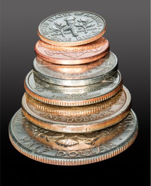 Stack of USA currency coins in macro clipart