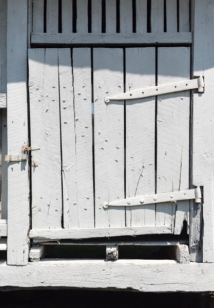 Old white wooden barn door — Stock Photo, Image