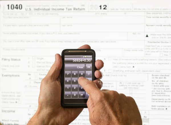 USA formulaire d'impôt 1040 pour l'année 2012 et calculatrice — Photo