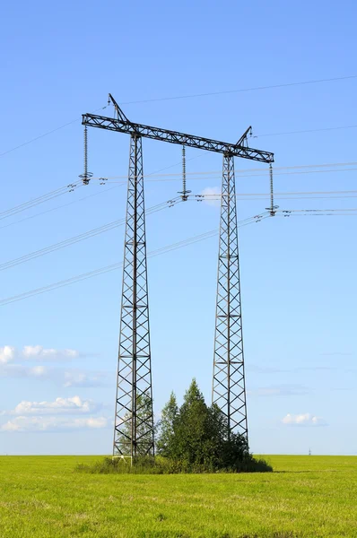 Transmission line on a background of blue sky — Stock Photo, Image