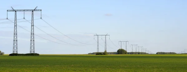 Panorama, transmission line on a background of blue sky — Stock Photo, Image