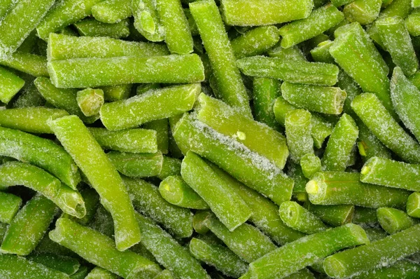 Background of the cut frozen green beans — Stock Photo, Image