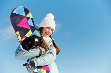 Happy sportswoman with snowboard clipart