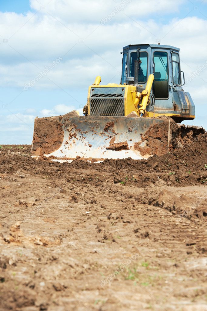 Track-type loader bulldozer excavator at work