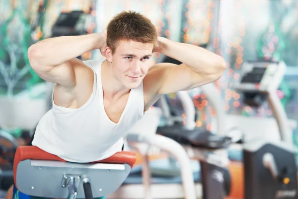 Bodybuilding man at abdominal crunch exercises — Stock Photo, Image