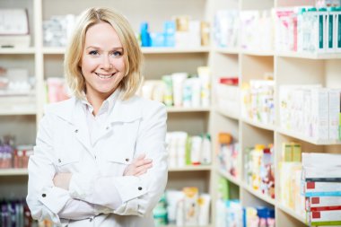 Pharmacy chemist woman in drugstore clipart