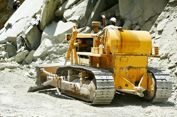 stock image Track-type loader bulldozer excavator at road work