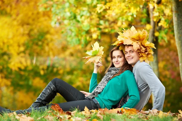 Couple at autumn outdoors — Stock Photo, Image