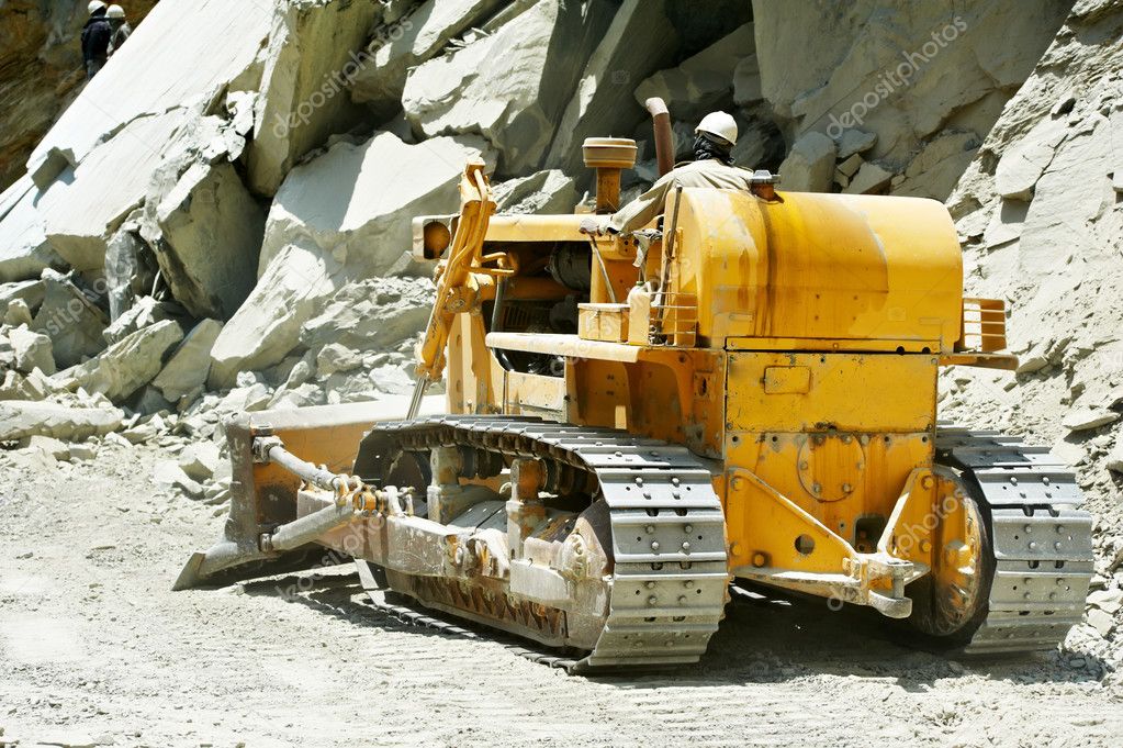 Track-type loader bulldozer excavator at road work
