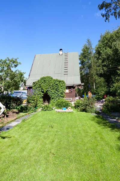 stock image House with landscaped front yard in Summer