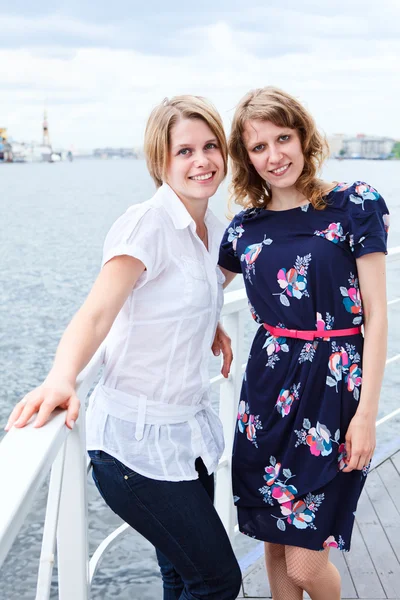 Two happy woman joyfull women enjoying a cruise time — Stock Photo, Image