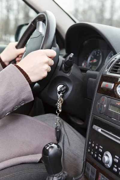 Women hands on steering wheel — Stock Photo, Image