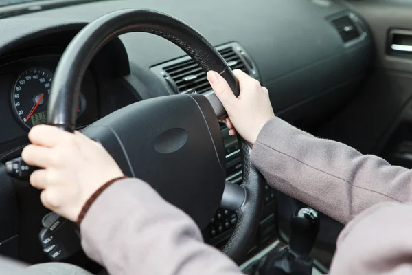 Hands position on steering wheel — Stock Photo, Image