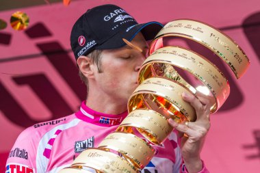 MILAN, ITALY - MAY 27: Ryder Hesjedal with Pink Jersey wins the Giro d'Italia of 2012 on May 27, 2012 in Milano, Italy clipart