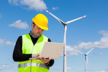 Technician Engineer in Wind Turbine Power Generator Station clipart