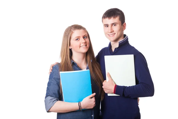 Par tonåriga elever på vit — Stockfoto