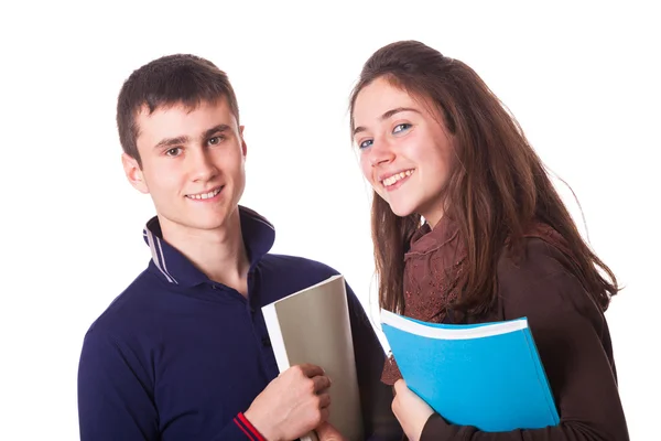 Para nastoletnich uczniów na biały — Zdjęcie stockowe
