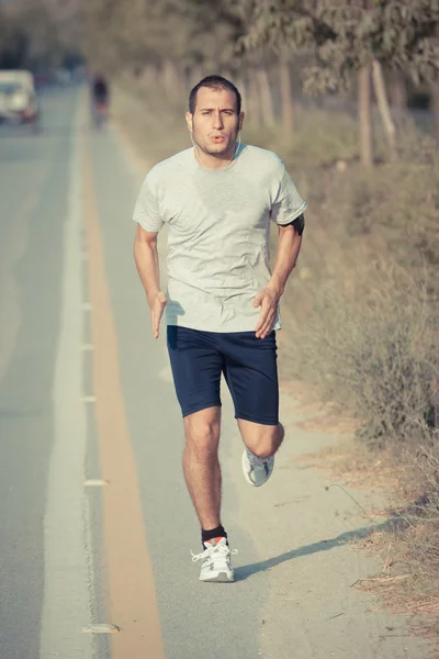 Unge mann Jogging – stockfoto