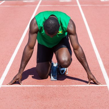 Male Track and Field Athlete before the Race Start clipart
